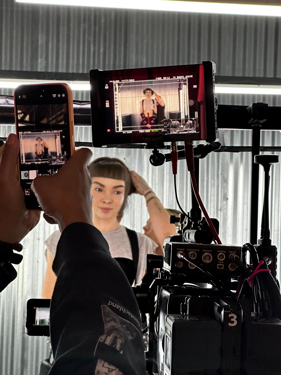 On-set monitor with Miquela comped in